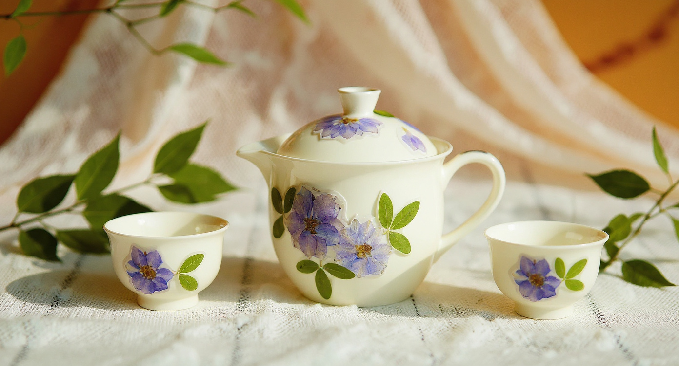 Handcrafted gaiwan with embedded real flower petals on bamboo tray