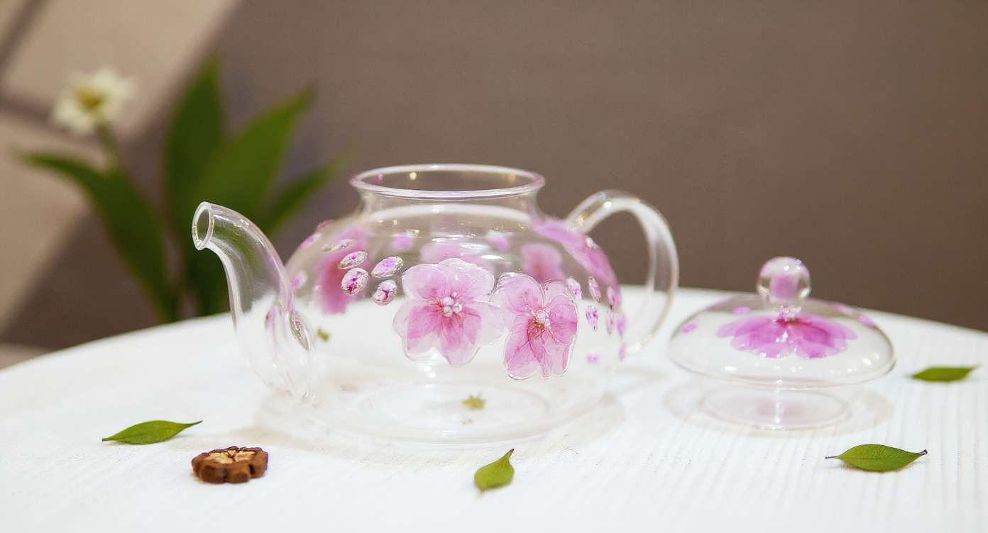Handmade Pressed Flower Glass Teapot & Cup Set with kraft gift packaging.