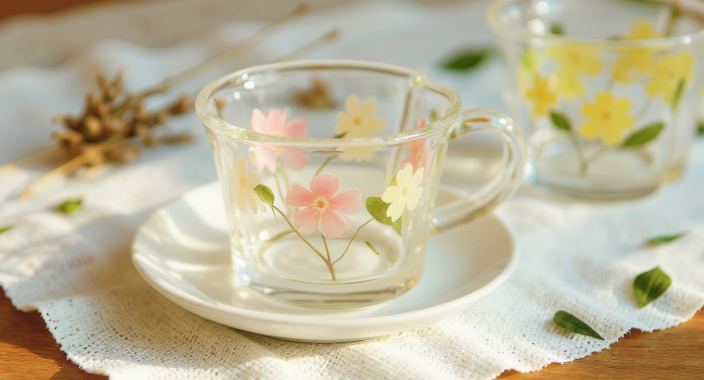 Pressed Flower Glass Cup & Saucer with wildflower vase and lavender on linen.